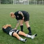 An athlete lying on ground