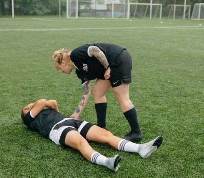 An athlete lying on ground